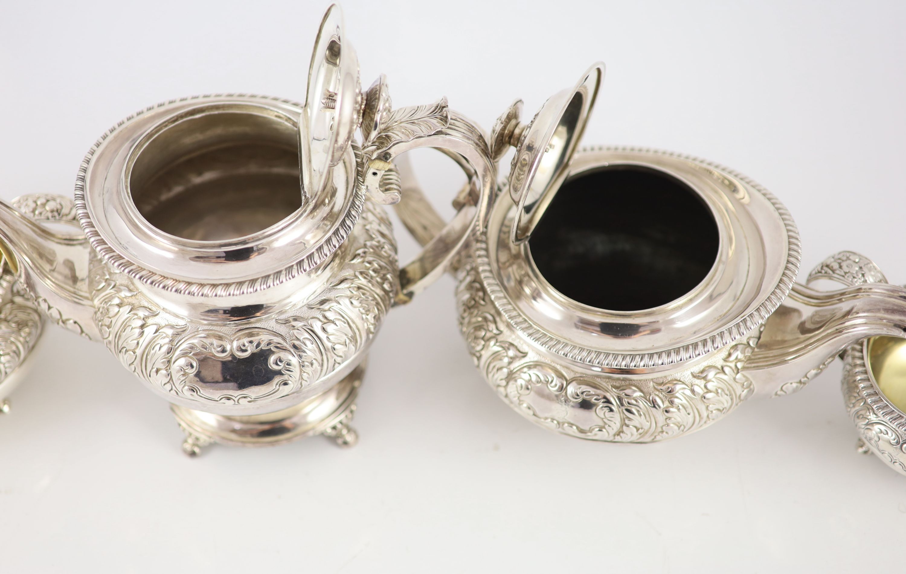 A George IV provincial silver three piece tea set by Barber & Whitwell, York, 1821 and a similar silver coffee pot, by Richard Pearce?, London, 1820